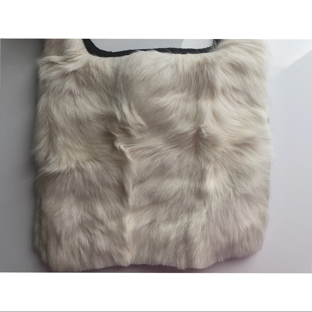 brand new, never used Prada fur crossbody bag.